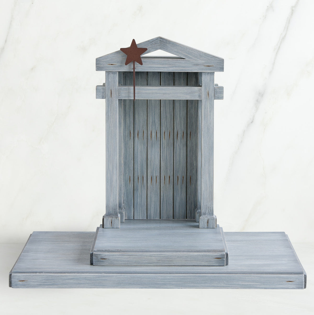 Grey wooden barn figurine open - brown star standing on it