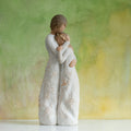 Willow Tree Close to me, 8"h hand-painted standing resin figure of woman embracing younger girl, both in cream dresses carved with intertwined vines and leaves, in front of olive green painting