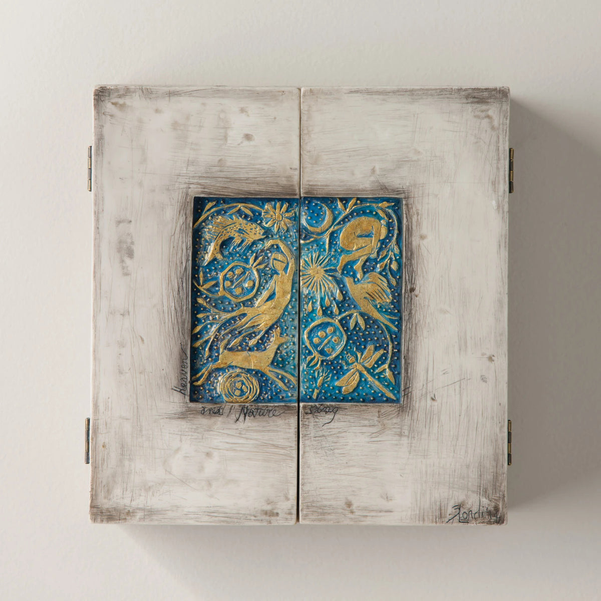 Willow Tree Starry Night Nativity, 8.5”h x 8”w x 2”d resin triptych with hinged doors, cream exterior with gold and blue details, doors open to 16”w with interior bas-relief Nativity scenes