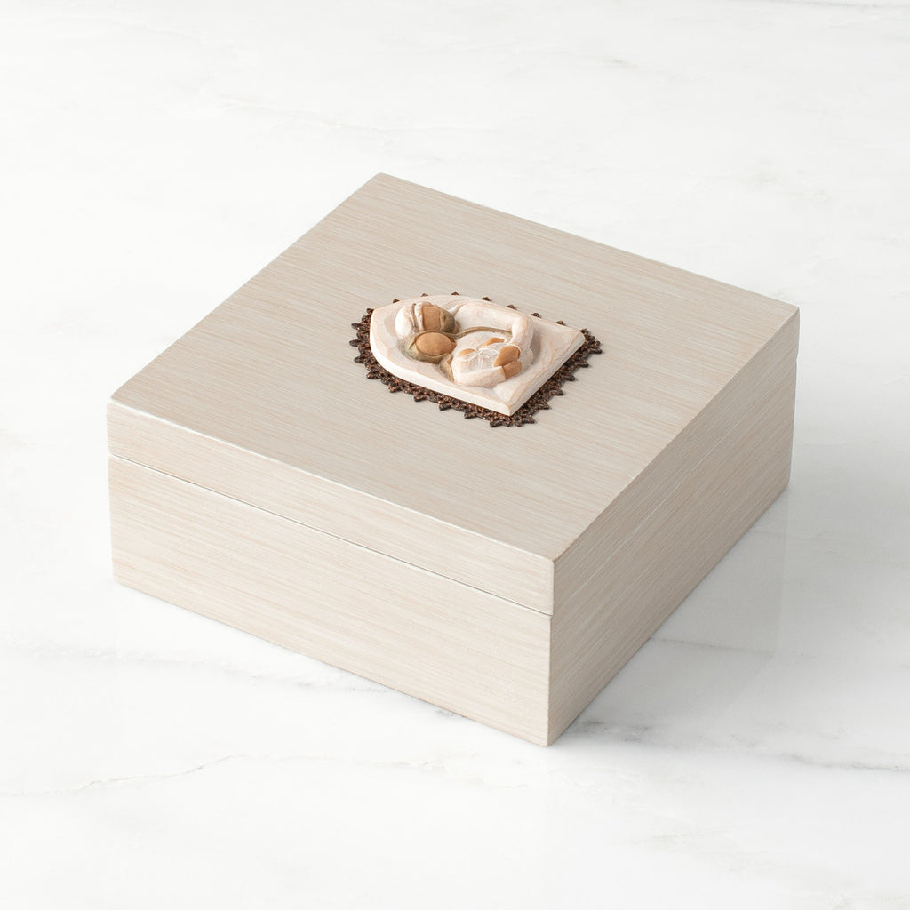 Side view: hand-painted cream square wood box, with hinged lid
