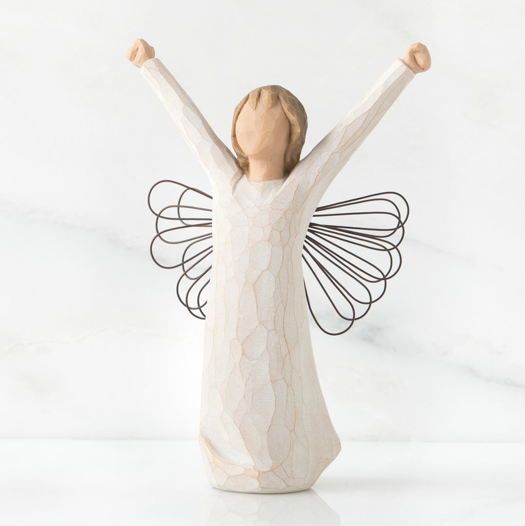 Angel faceless figurine wearing white dress with arms up - wings are wire